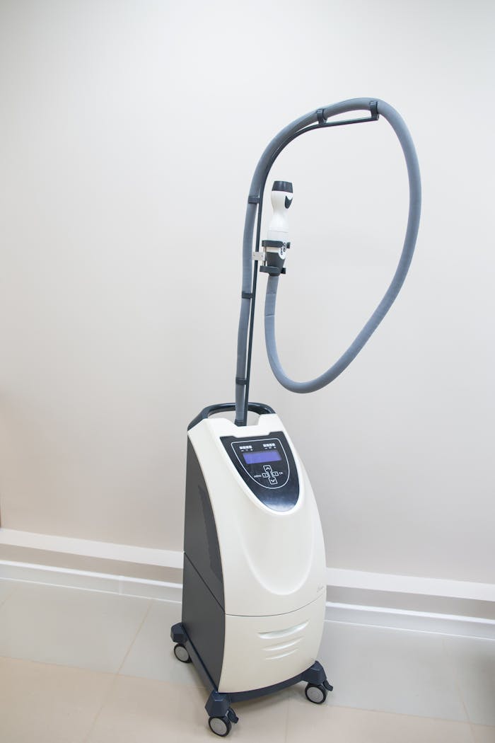 High-tech medical diagnostic machine in a sterile clinic environment.